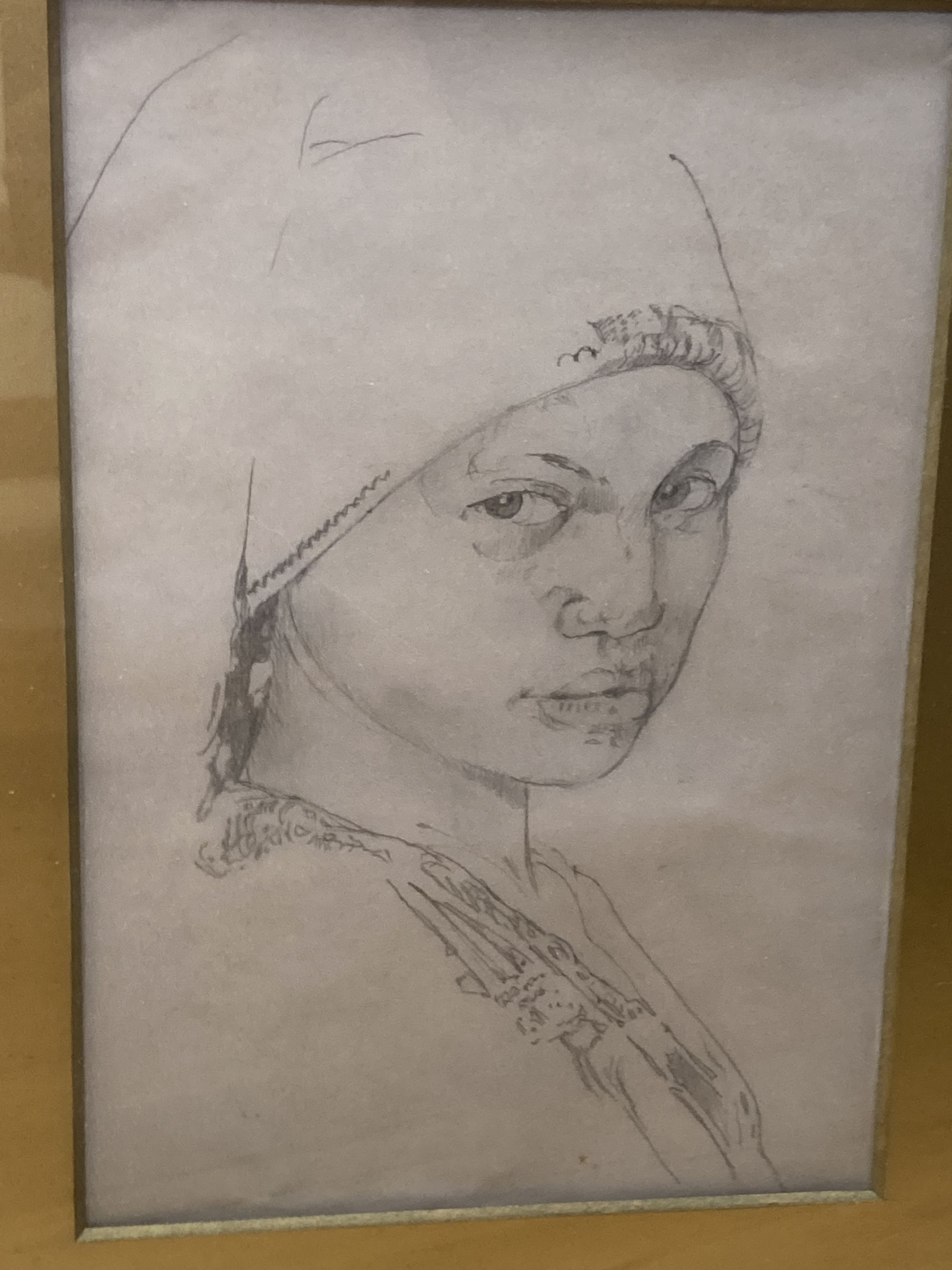 English School c.1900, pencil drawing, Study of a North African womans head, 20 x 18cm and an oil sketch of a fishing village, 22 x 29